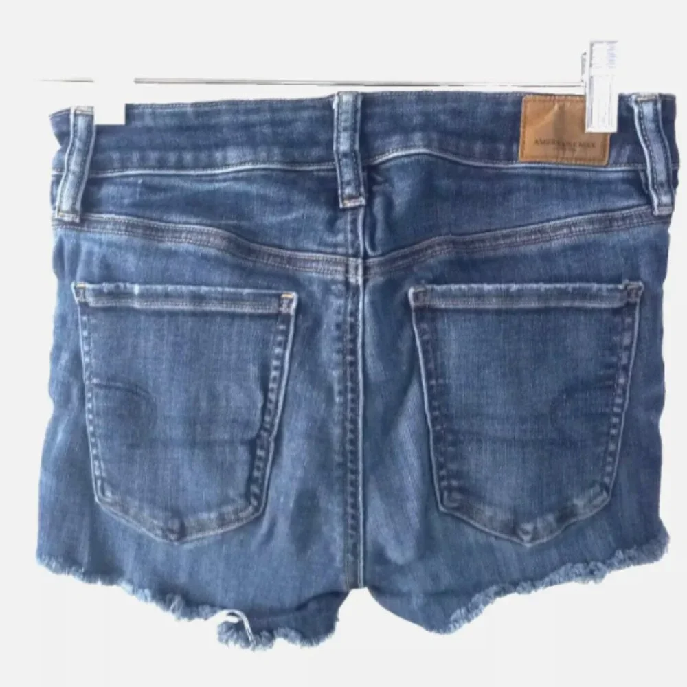 American Eagle Outfitters Distressed Denim Shorts Size 4 Raw Hem Blue Festival